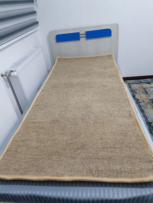 sleeping on a wool felt rug