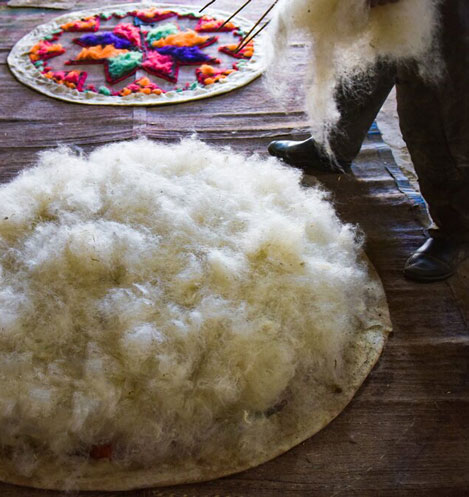 Top view of a natural wool felt rug by ToghanFelt